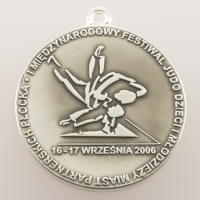 medal odlewany; wykończenie srebrzone przyciemniane; średnica 50mm