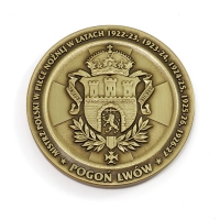 medal tłoczony z mosiądzu; średnica 70 mm; wykończenie przez patynowanie; medale wykonane na zamówienie Klubu Piłkarskiego Pogoń Lwów 