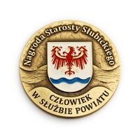 medal tłoczony z mosiądzu; wykończenie przez patynowanie; malowany kolorami; medal bity dla Powiatu Słubickiego
