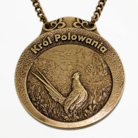 medal myśliwski; motyw bażant; Król Polowania; wykończenie w kolorze patynowanego mosiądzu