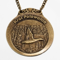 medal myśliwski; motyw kaczka; Król Polowania; wykończenie w kolorze patynowanego mosiądzu