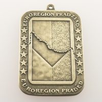 medal odlewany; wykończenie w kolorze patynowanego mosiądzu; wymiary 45 x 65 mm