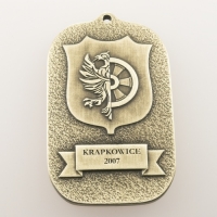 medal odlewany; wykończenie w kolorze patynowanego mosiądzu; wymiary 45 x 70 mm