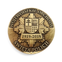 medal odlewany o średnicy 70 mm; wykończenie w kolorze patynowanego mosiądzu; medal wykonany z okazji Wojewódzkich Obchodów Święta Policji KWP w Kielcach