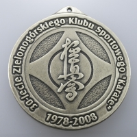medale odlewane; wykończenie w kolorze patynowanego mosiądzu; średnica 70mm
