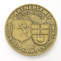 medal odlewany; wykończenie w kolorze patynowanego mosiądzu ; średnica 70mm