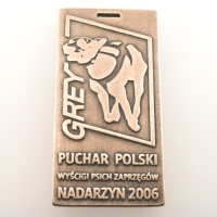 medal odlewany; wykończenie w kolorze patynowanej miedzi; wymiary 45 x 90 mm