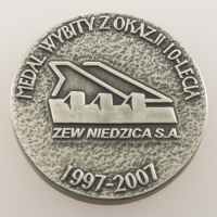 medal odlewany; wykończenie w kolorze srebra patynowanego; średnica 50mm