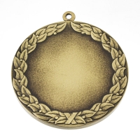 medal tłoczony z mosiądzu; wykończenie przez patynowanie; średnica 70mm; strona przygotowana na personalizującą wkładkę grawerowaną