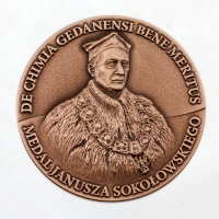 medal tłoczony z mosiądzu; wykończenie w kolorze brązu patynowanego