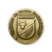 medal tłoczony z mosiądzu; wykończenie przez patynowanie; średnica 70 mm; medal wykonany dla Starostwa Powiatowego w Grudziądzu