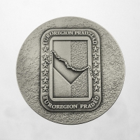 medal tłoczony z mosiądzu; wykończenie przez srebrzenie oraz patynowanie