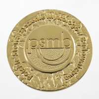 medal tłoczony z mosiądzu; wykończenie przez złocenie; średnica 70mm