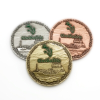medal tłoczony z mosiądzu; wykończenie w trzech kolorach; średnica 70 mm