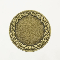 medal uniwersalny; średnica 60mm; motyw - ozdobny wieniec laurowy; wykończenie w kolorze patynowanego mosiądzu; wkładka 38mm